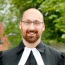 Das Foto zeigt Pfarrer Ehgart